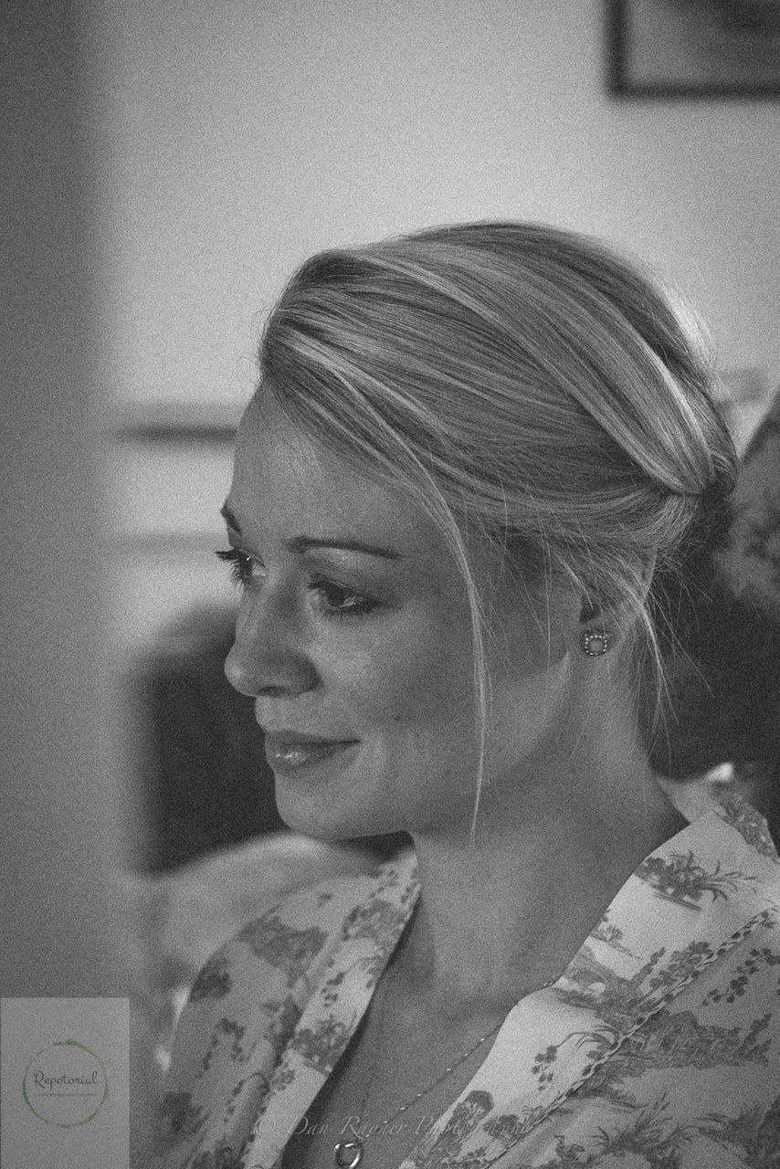 Wedding reportage photo of bridesmaid during the morning prep before the ceremony