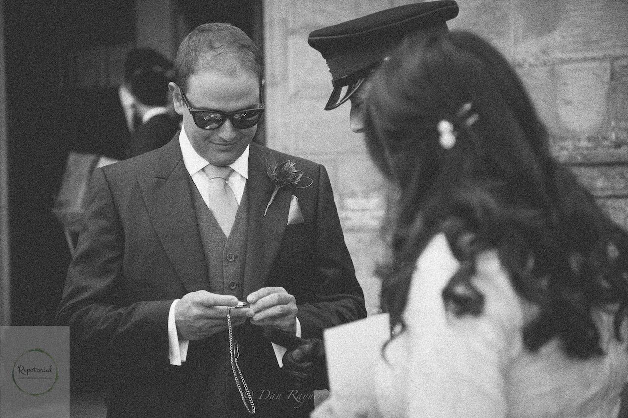 Guests enjoying the wedding reception captured in candid style.
