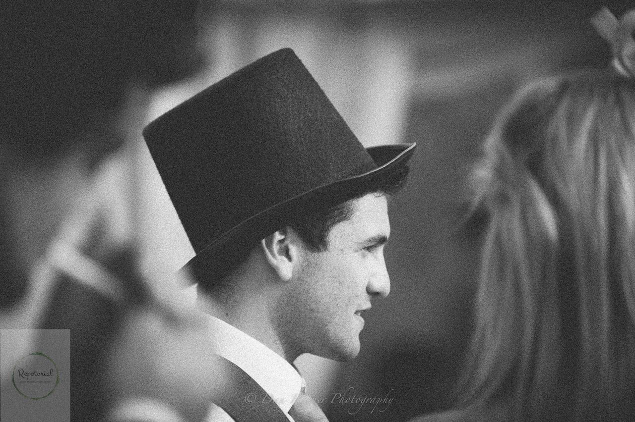Guests enjoying the wedding reception captured in candid style.