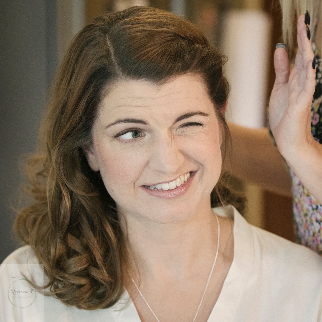 documentary shot of bride during her make up