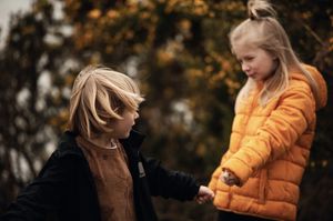 Siblings sharing a playful moment together
