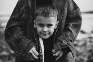 Close-up portrait of a happy child in warm light
