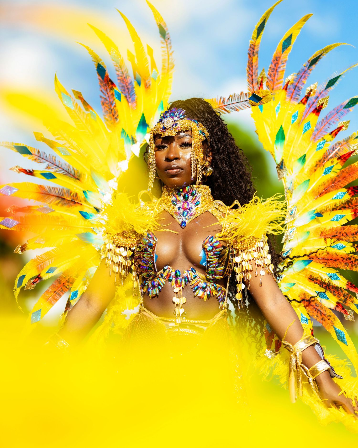 Carnival dancer in yellow — vibrant festival photo by Timoy B Photography, Antigua.