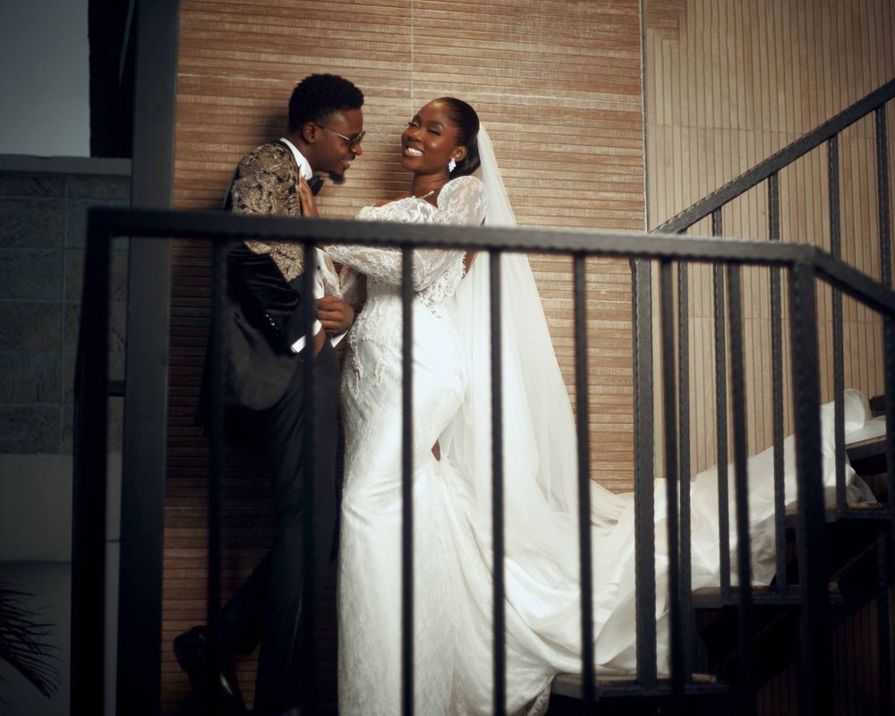 Romantic wedding portrait captured by Roy Ayomide Studios with timeless storytelling and elegant composition.