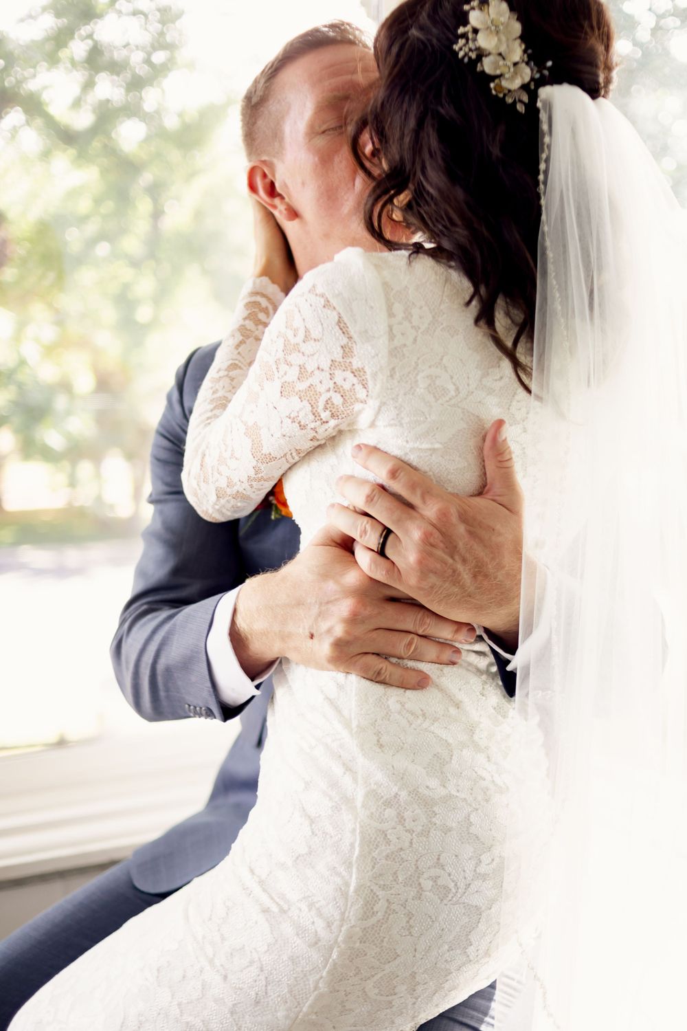 intimate wedding couple kissing photographed by photographer in missouri