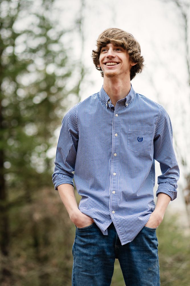 Jefferson County High School high school senior boy portrait taken in the woods by Douglas Lake in Dandridge