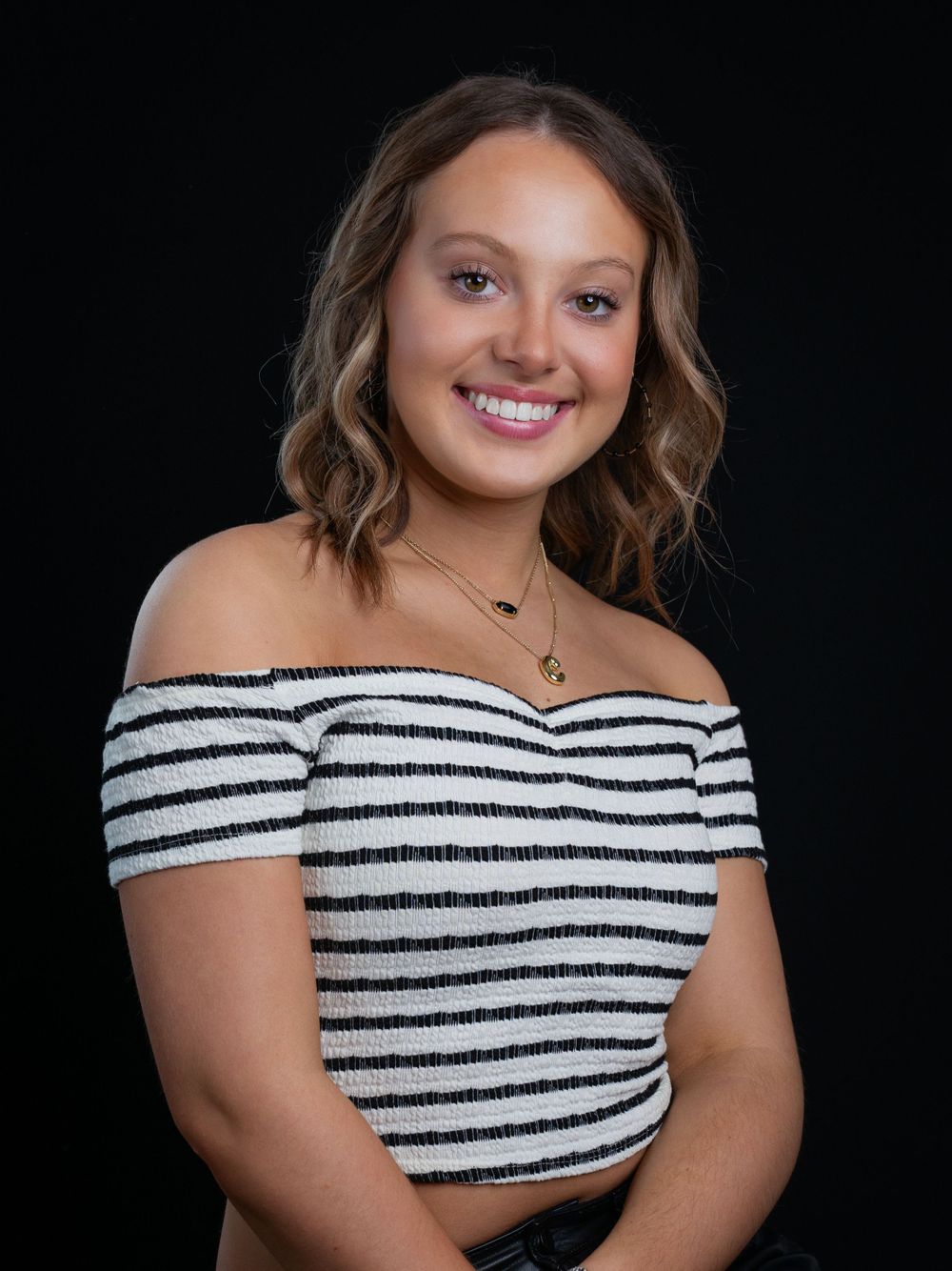 Photo of Jefferson County high school senior girl by senior portrait photographer in Dandridge studio in East Tennessee.