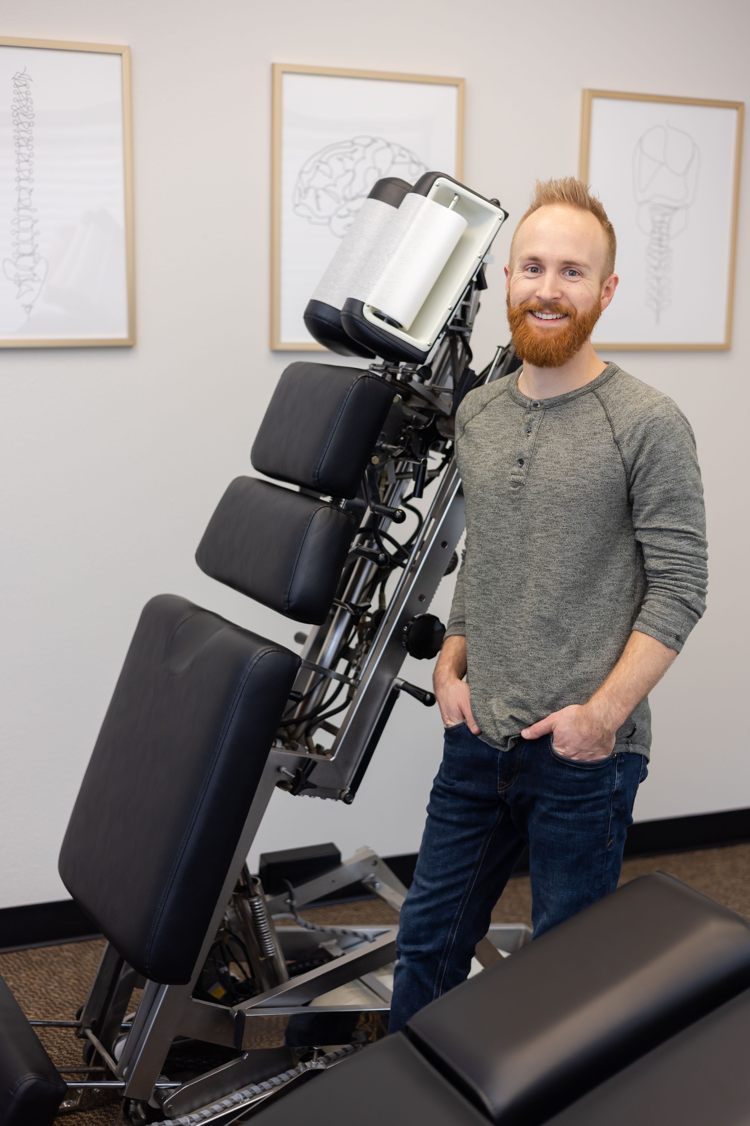 Limitless chiropractic in Sumner WA, man standing in adjustment room for lifestyle headshot