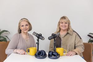 lifting women podcast business owners for environmental eco-friendly practices headshot of 2 women at desk in Auburn, WA studio