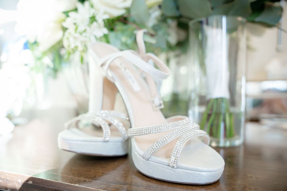 Photograph of bride's shoes at Evergreen Springs by Wedgewood in Elk Grove, CA by Elk Grove Wedding Photographer, Ashley Nicole Baeza.