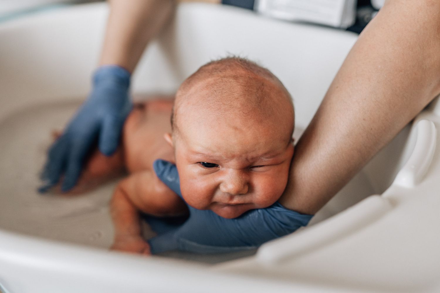 first baby bath during hospital fresh 48 shoot in Dubai