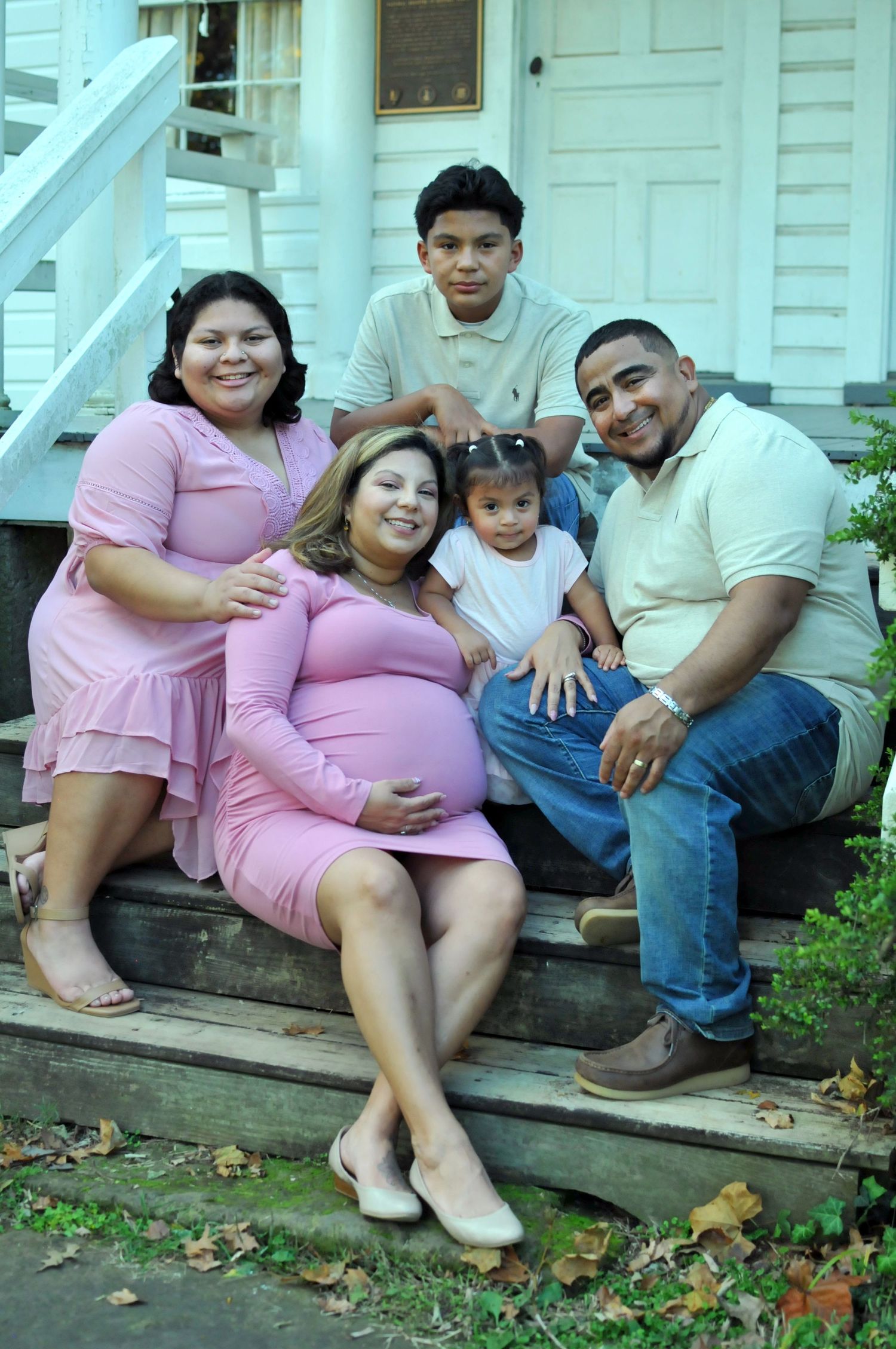 Family sitting together on steps