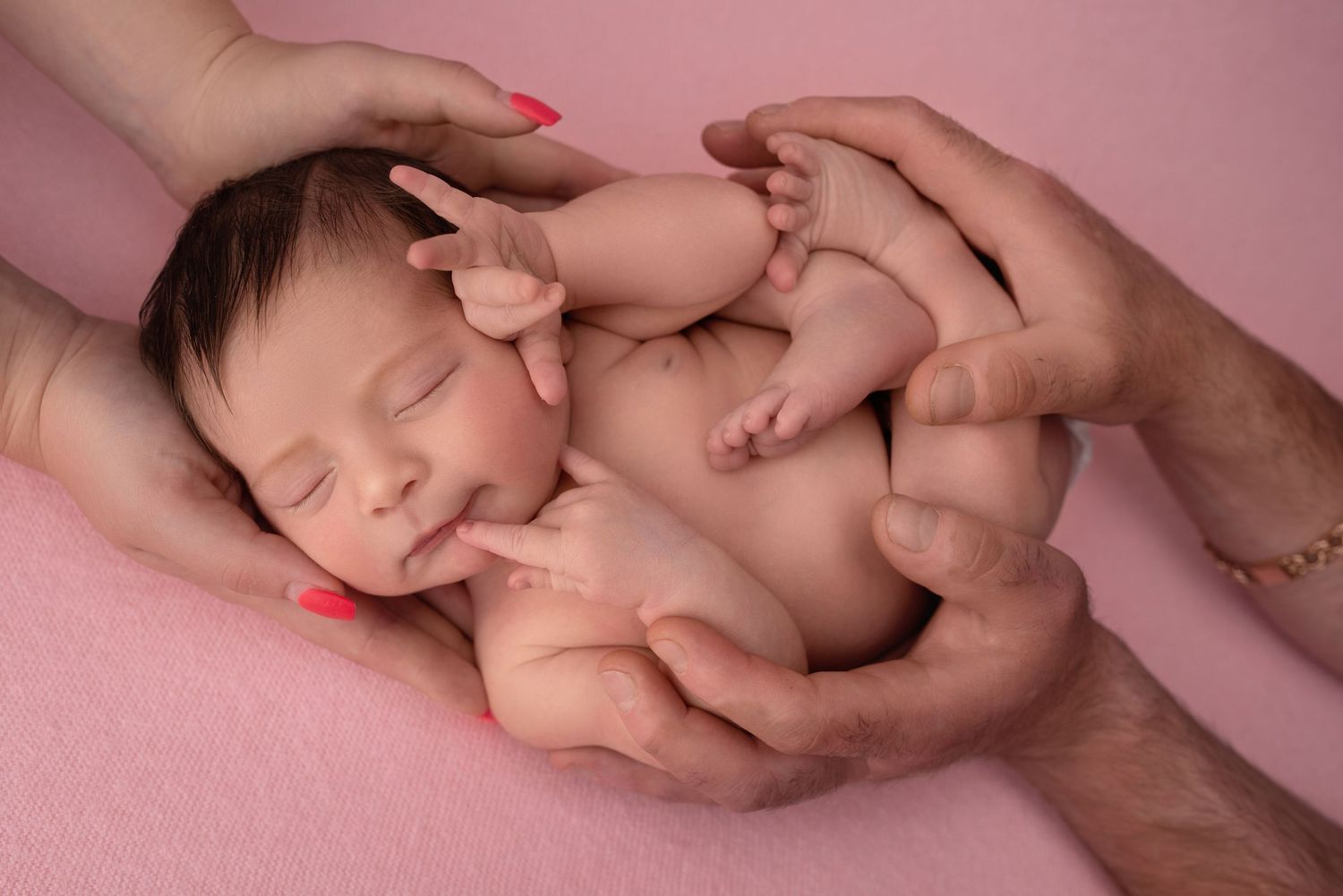 baby girl curled portrait during newborn photoshoot West Midlands