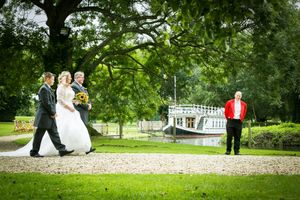 Bride walking down the aisle at De Vere Oxford Thames