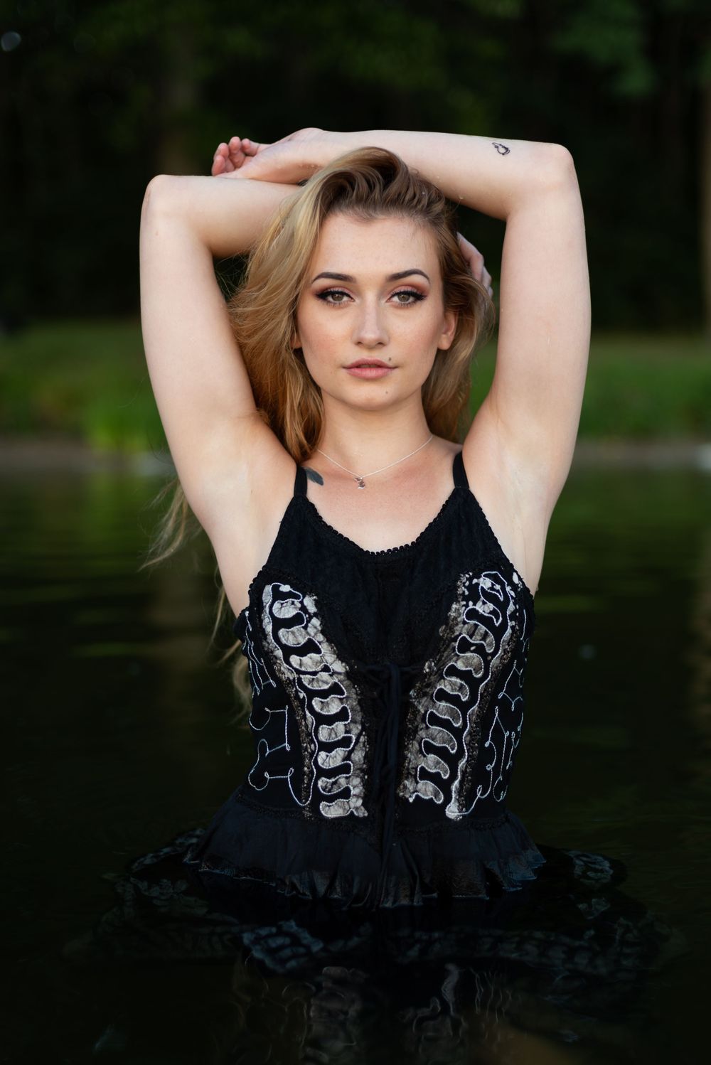 Girl modeling in a lake