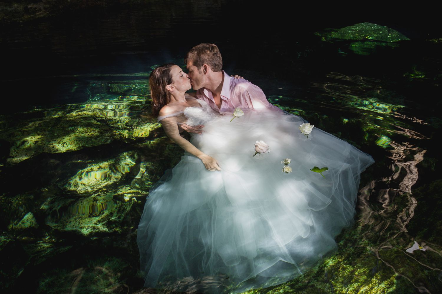 trash the dress cenote under water photo sessions bride groom crystalline water