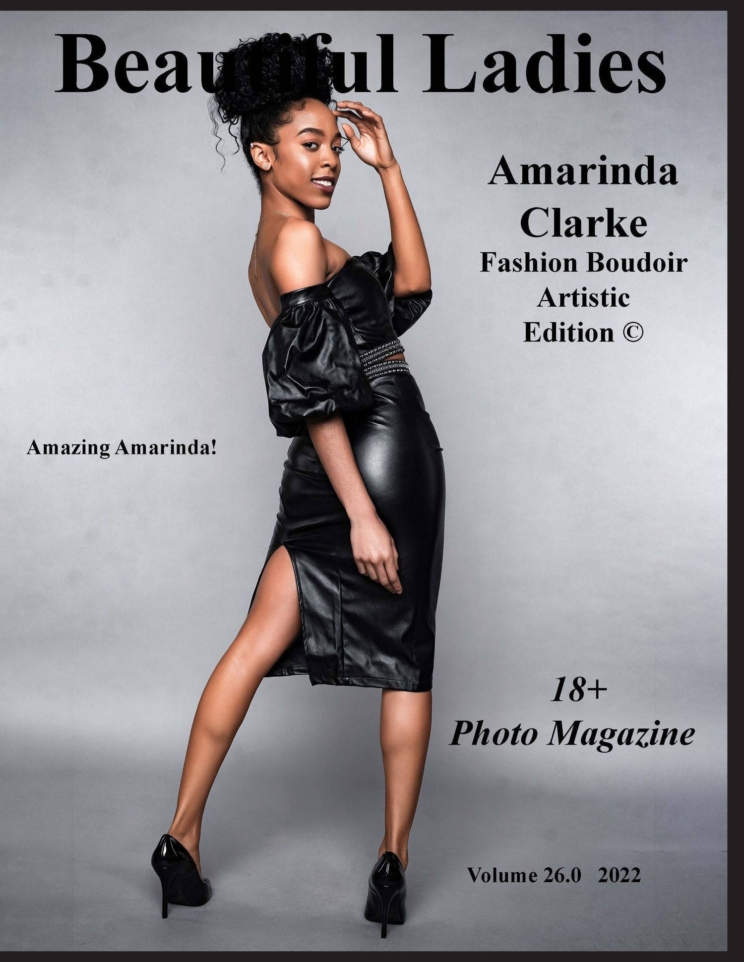 Fashion magazine cover featuring black leather dress and elegant pose.