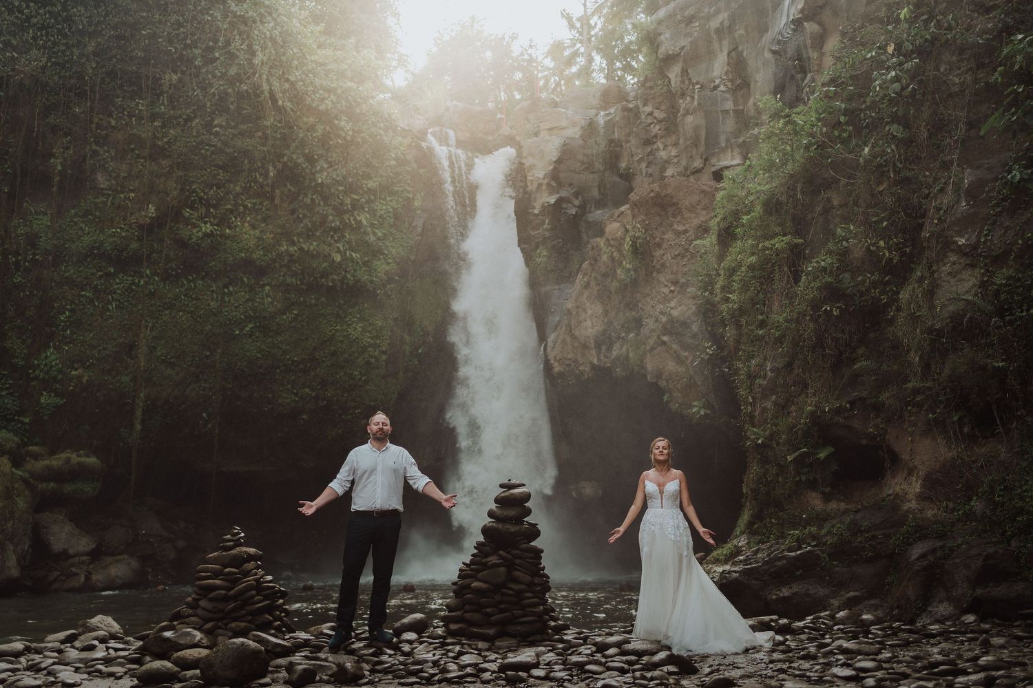 A couple having couple session at Blangsinga Waterfall