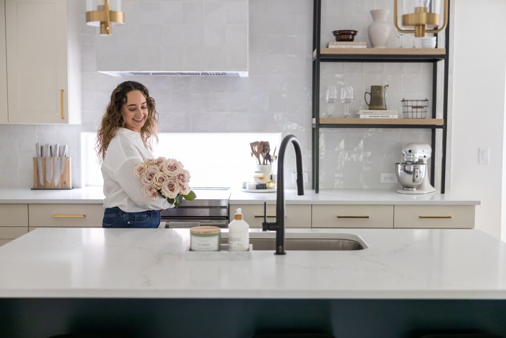 Fairspring Designs an Interior Designer in Maple Valley, WA lifestyle personal branding photos woman holding flowers