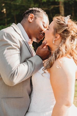 An intimate moment between a couple during their wedding day celebration.