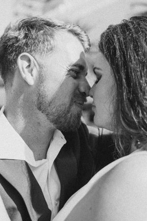 Black and white romantic close-up sequence of intimate wedding moment.