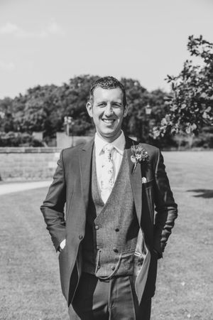 Black and White image of groom at Cheshire wedding