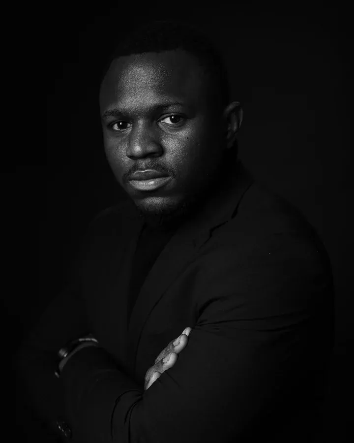 Dramatic black and white portrait series with moody lighting and dark shadows.