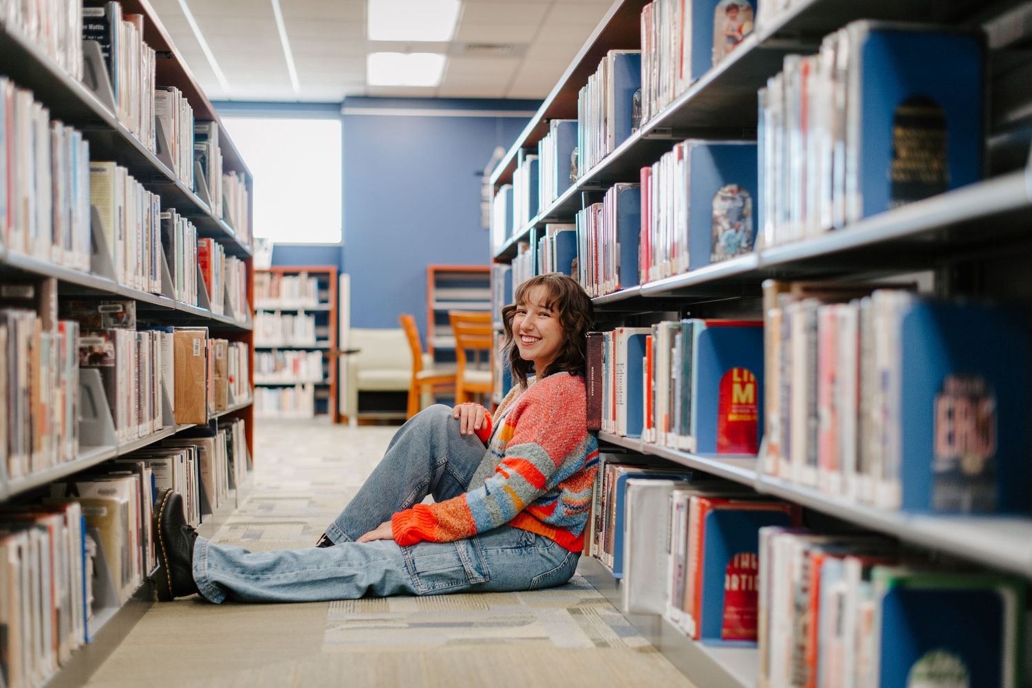 Derby high school senior pictures taken at local library and greenhouse in Wichita, KS