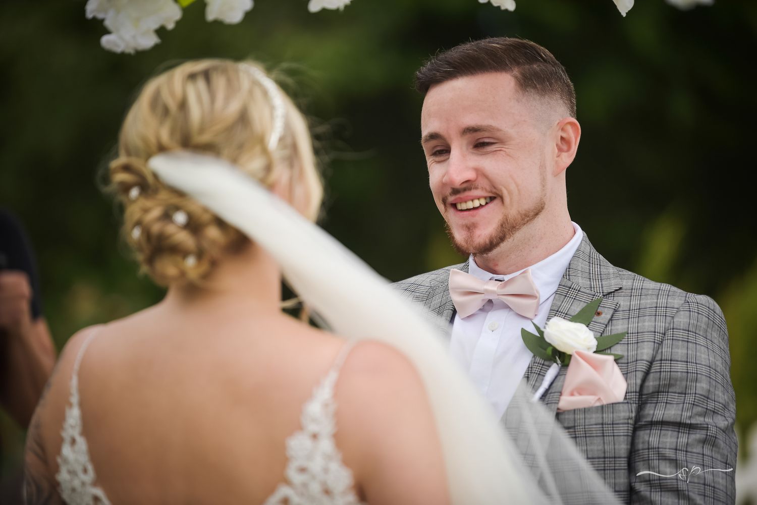 Bride and Groom at the altar at Trunkwell House during summer outdoor wedding, wedding photographer