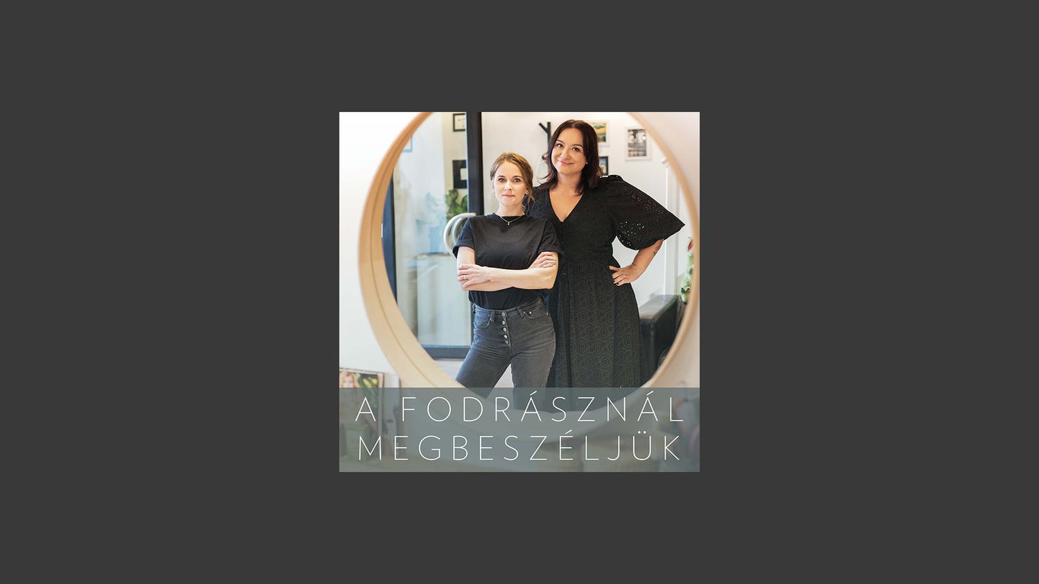 Two podcast hosts posing together in a studio setting for their show artwork.