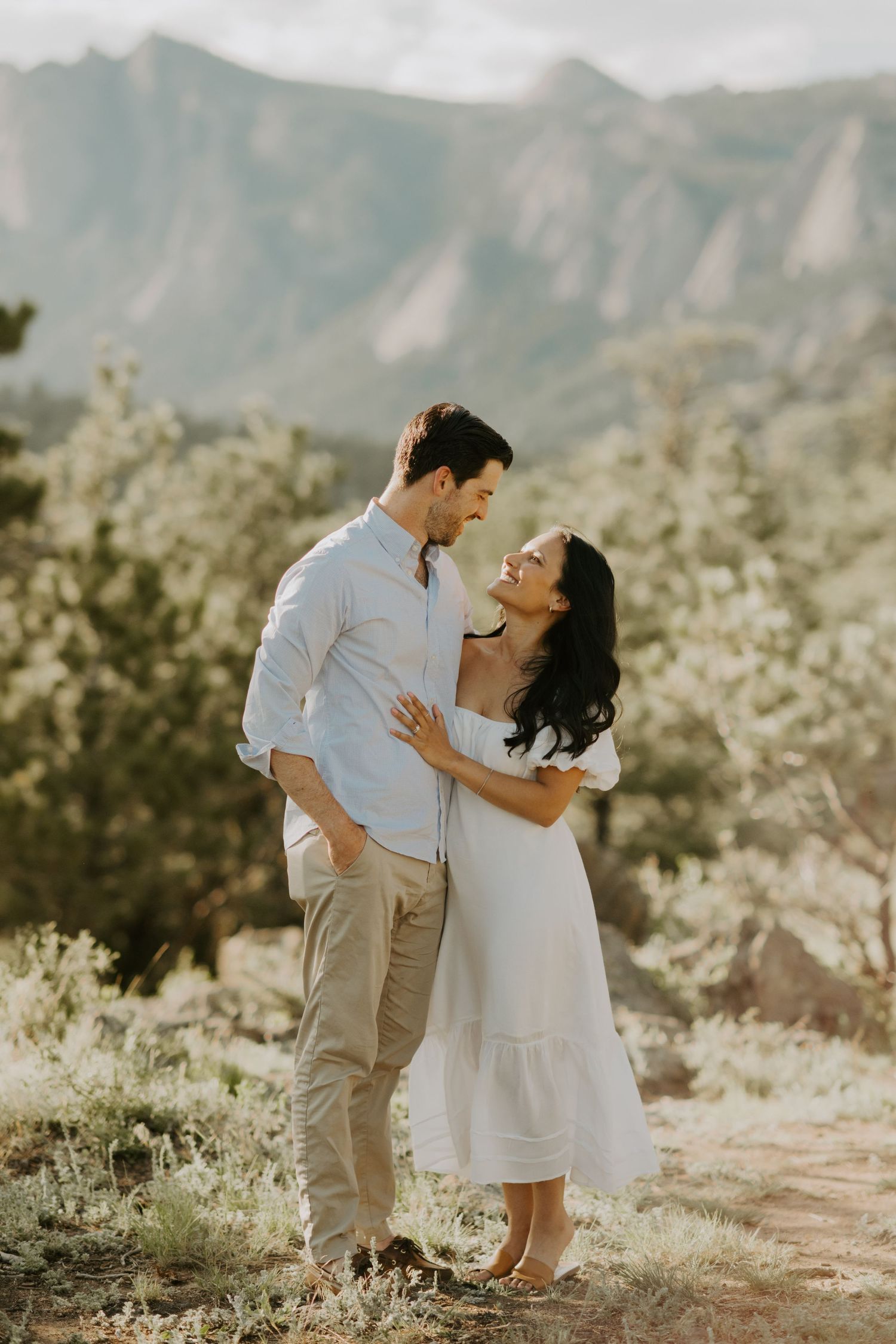Husband and wife look at each other in Estes Park, Colorado
