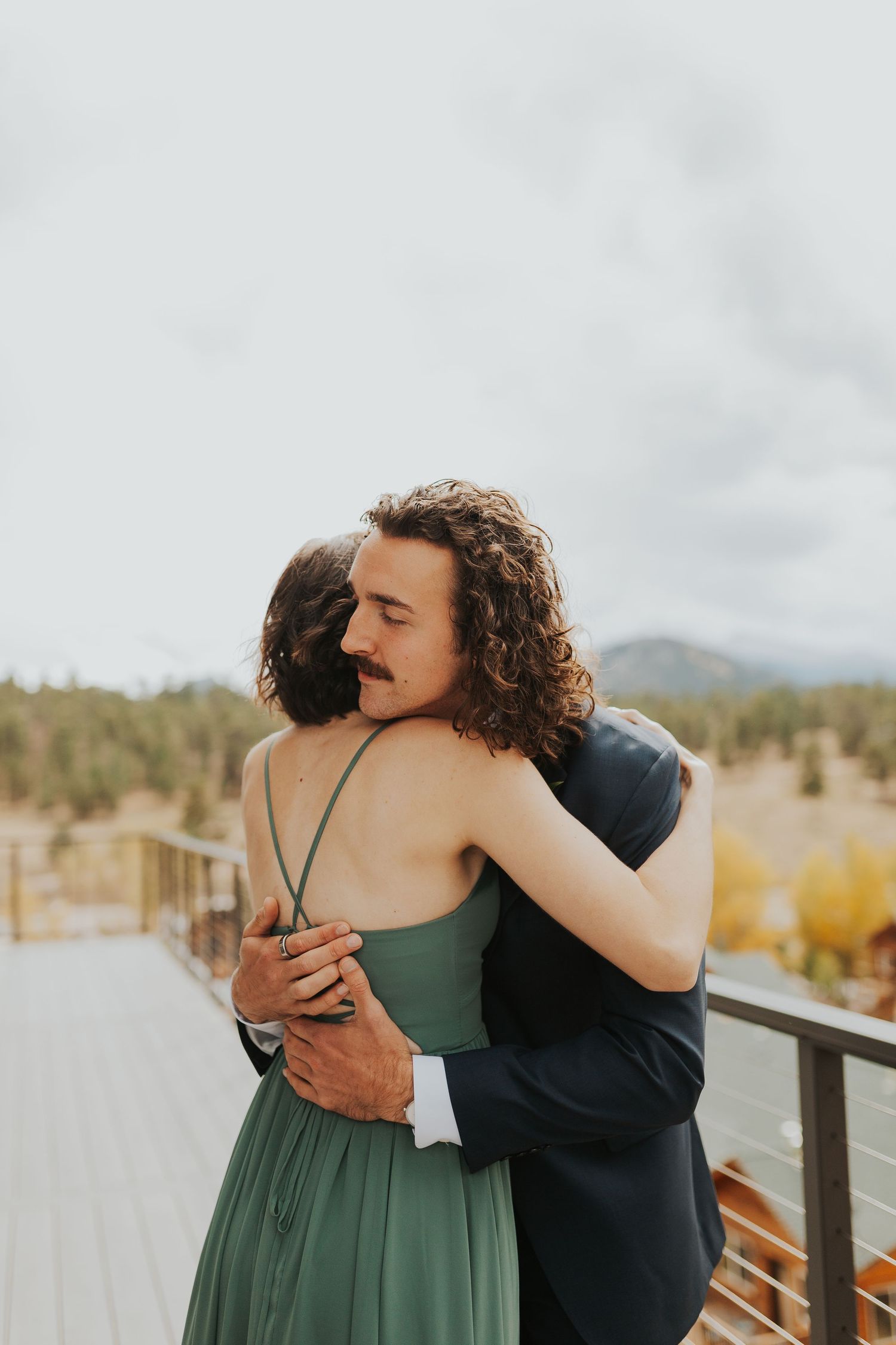 groom and sister hugging