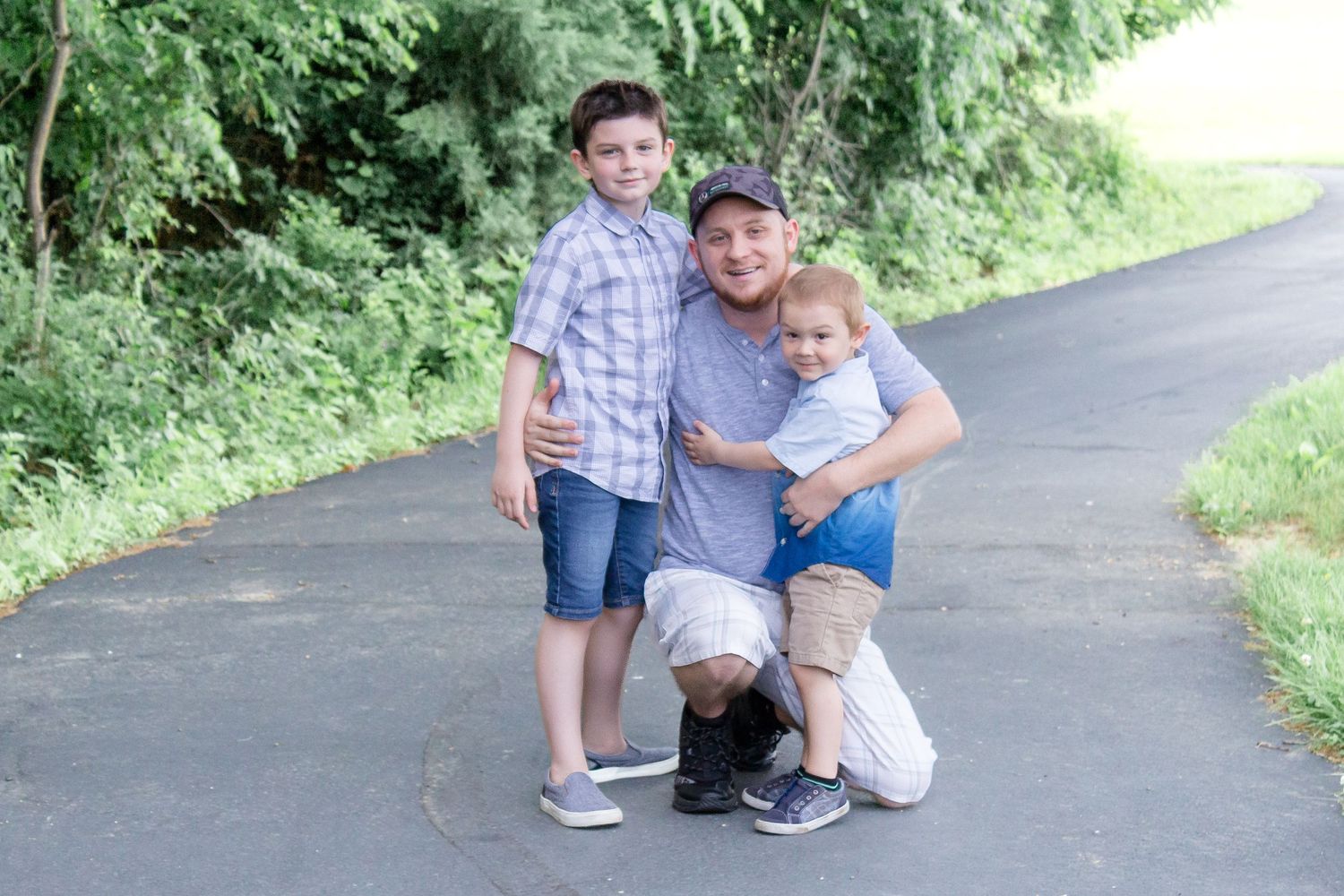 Dad and son Dad and kids Father's Day family pictures Quail Ridge Park St. Louis Give It A Shot Photography