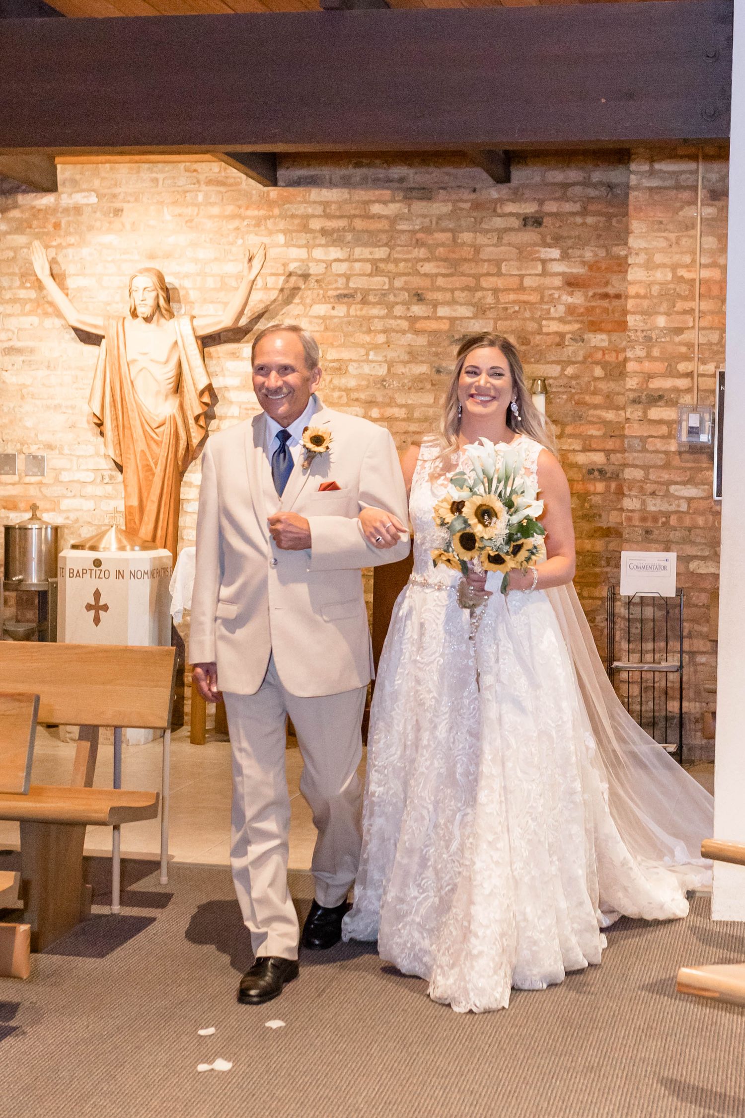 bride and father walking down the aisle