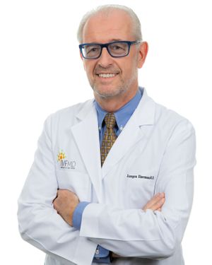 Medical team members in white coats display friendly and professional demeanor.
