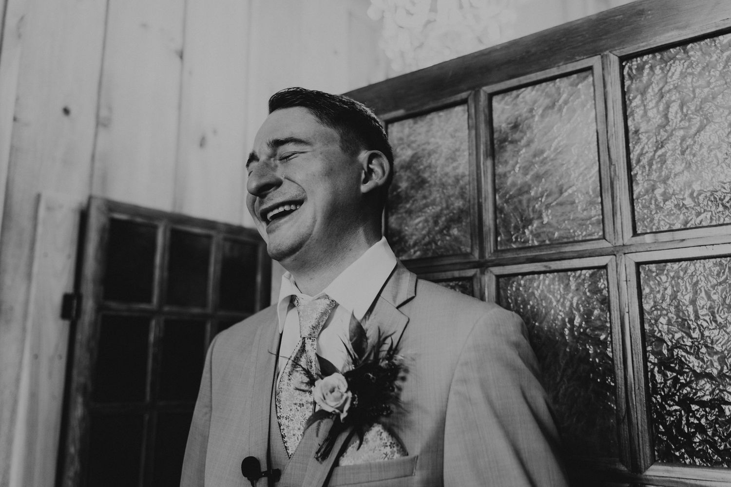 Groom crying during first look