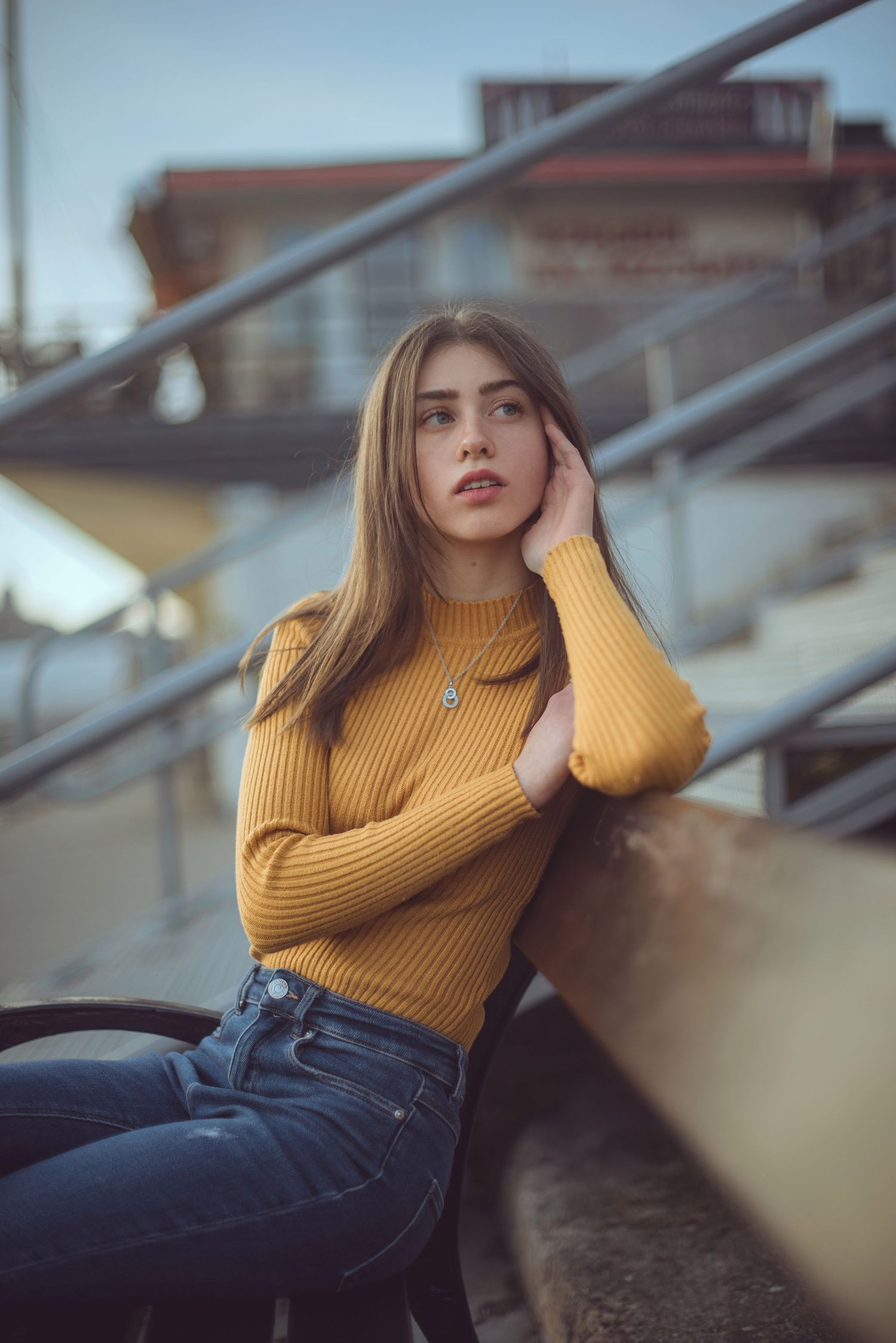 girl posing for a photo shoot during sunset in budapest hungary