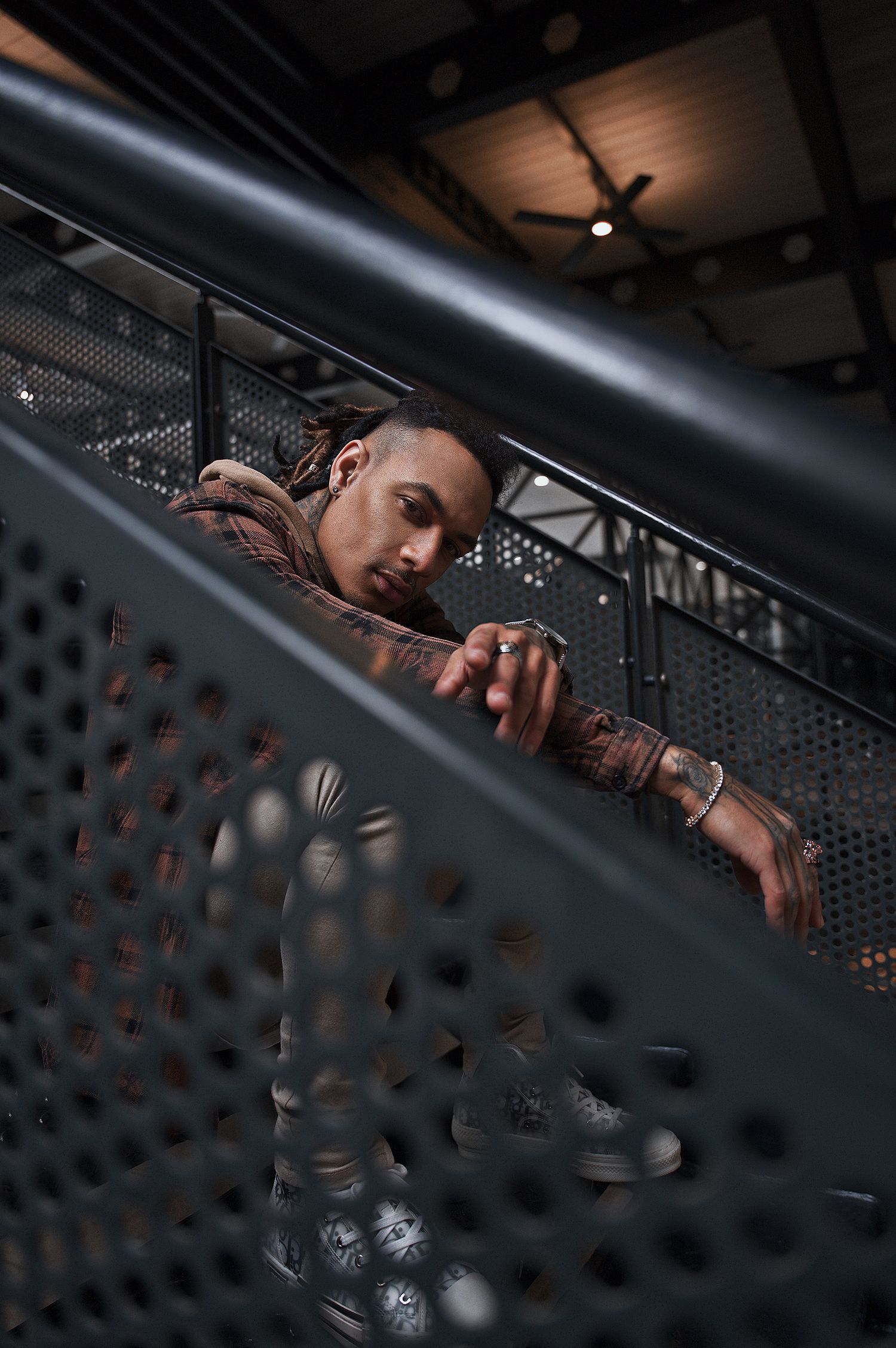Urban Portraits: Poses for models male. Strong portrait of male model on the steps in London