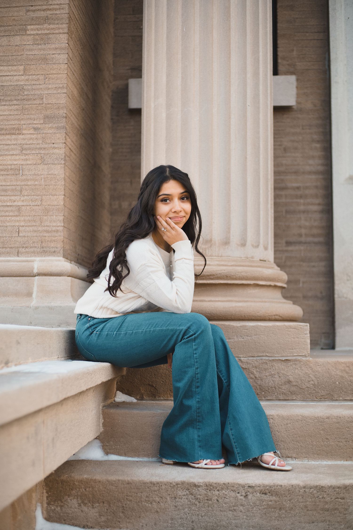 watertown public library madison wi high school senior portraits photos female wintery outdoors building brick pillars