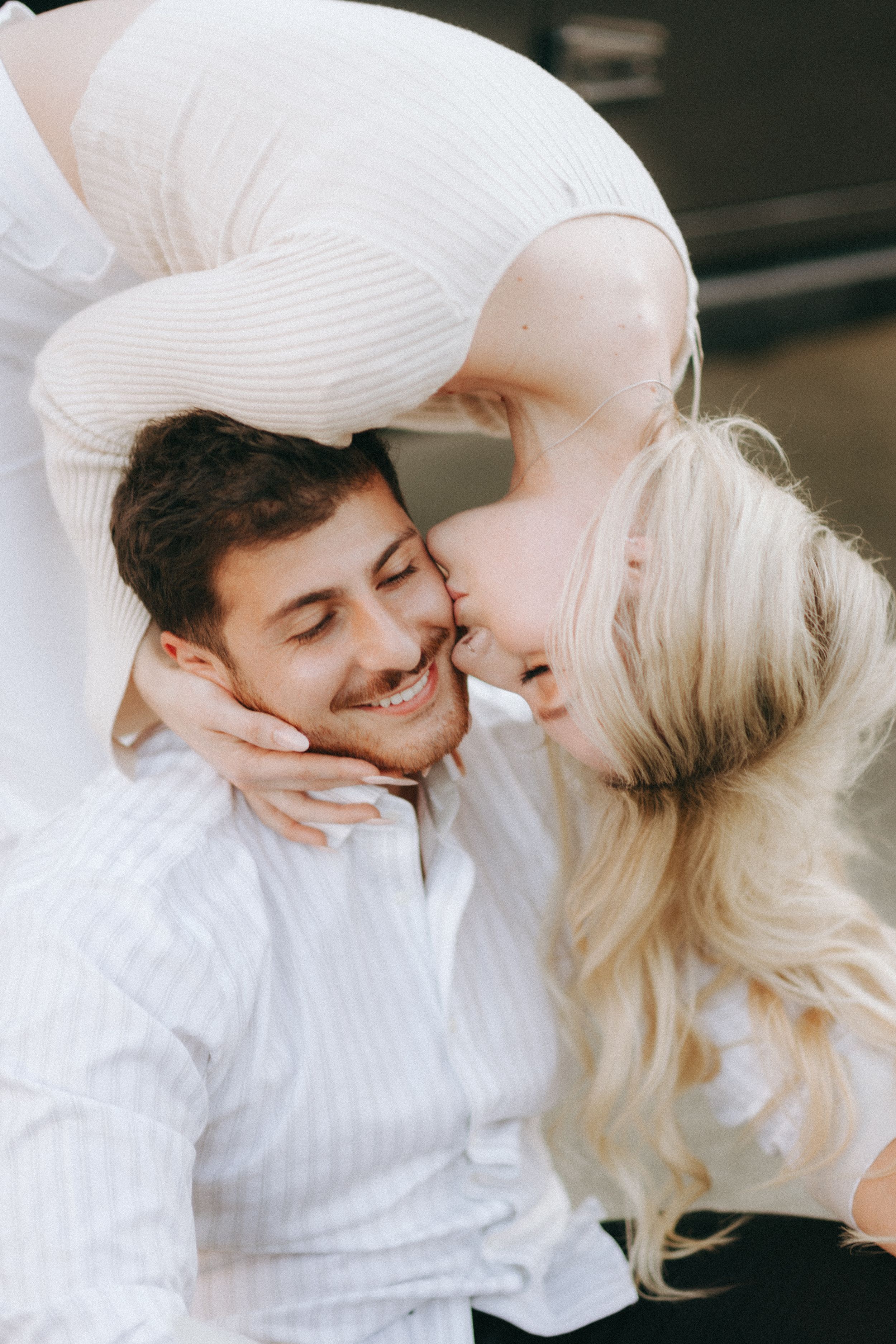 An intimate close-up portrait of a couple sharing a tender moment together.