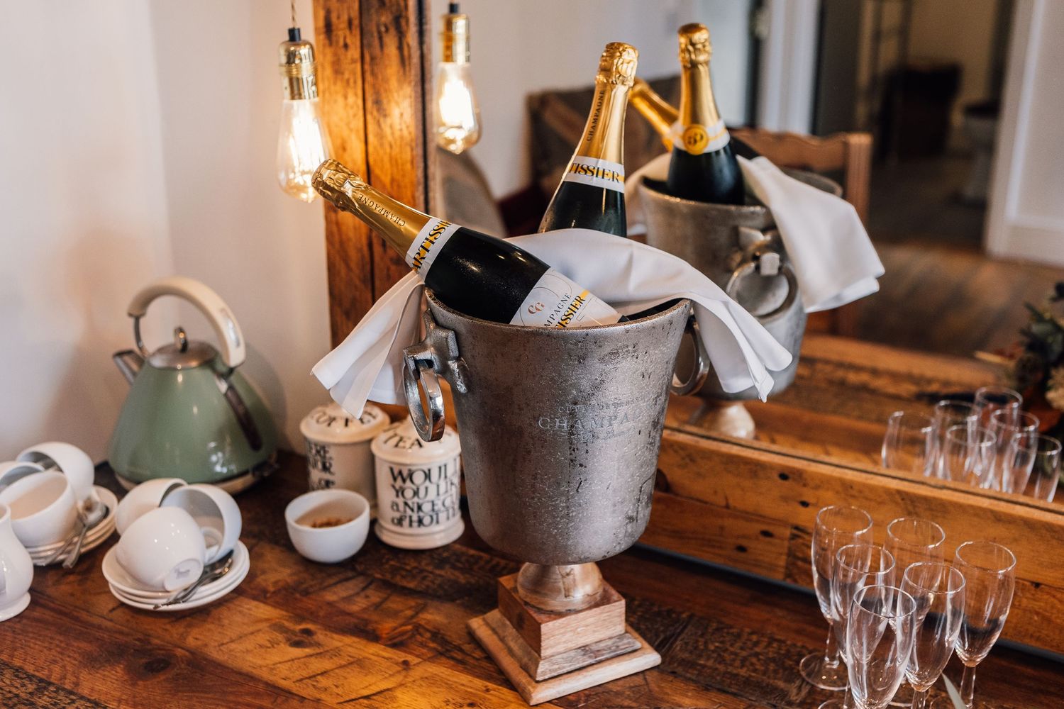 champagne bottle in ice bucket