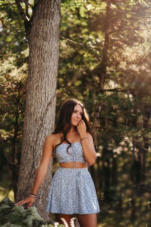 Dreamy forest portrait with soft lighting and patterned summer dress in the Hudson Valley,NY.