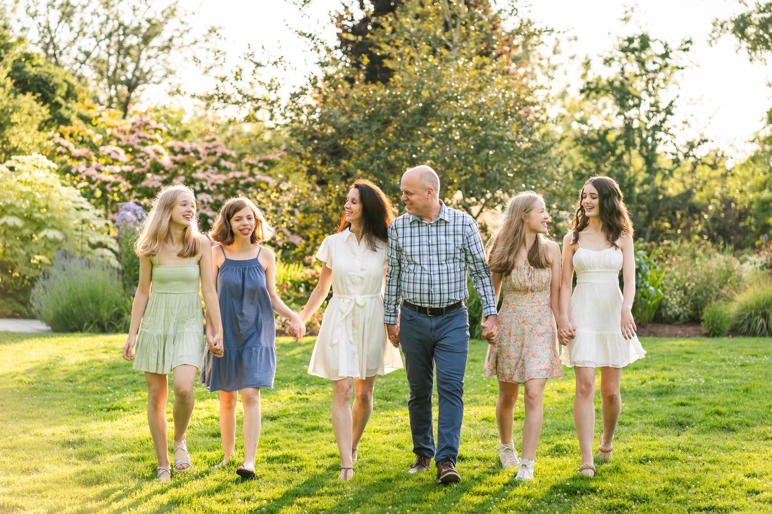 Candid photo of family walking at Bellevue Botanical Garden.
