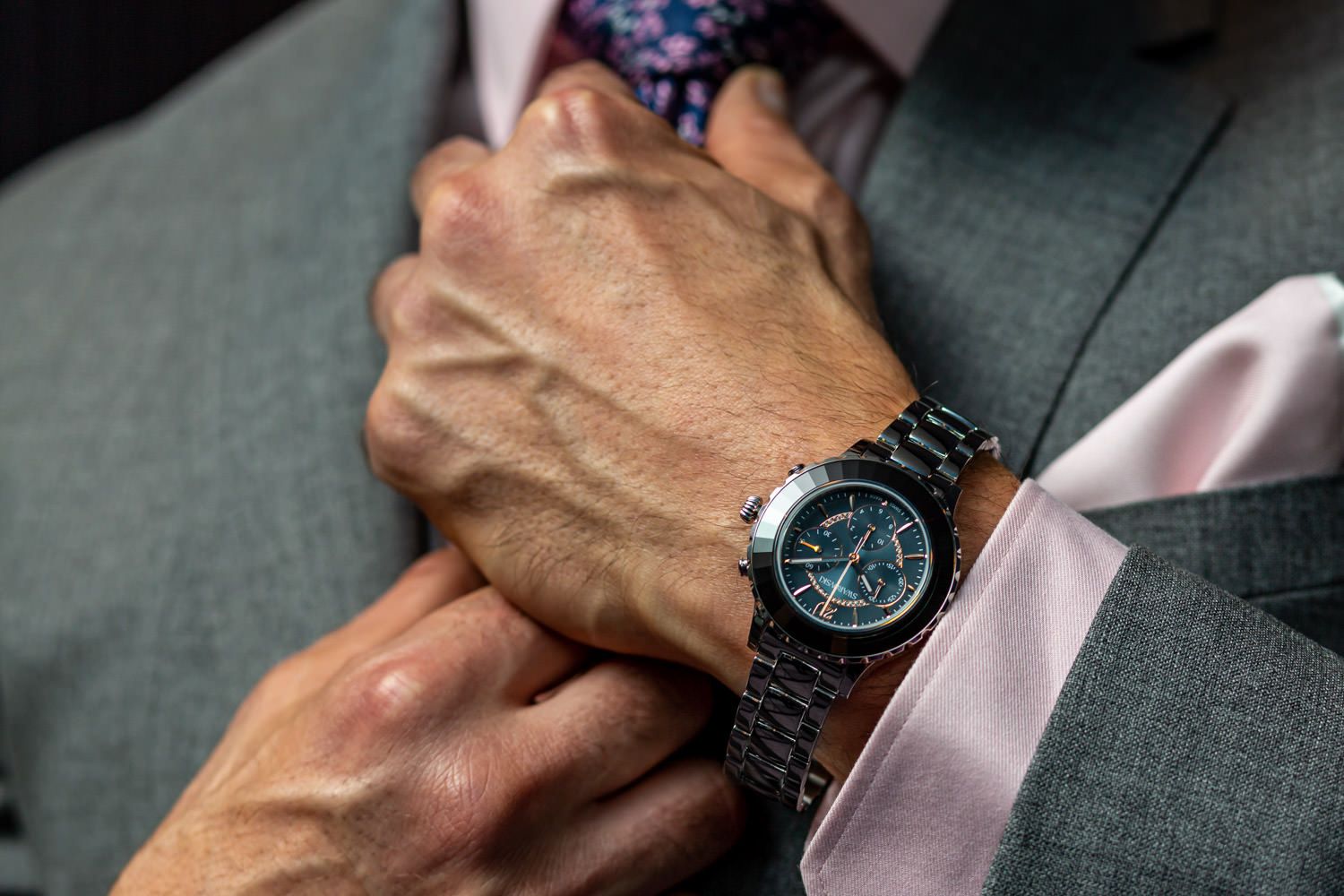 A product shot with a model wearing a Swarovski watch as part of a magazine advertising campaign by Danny Loo