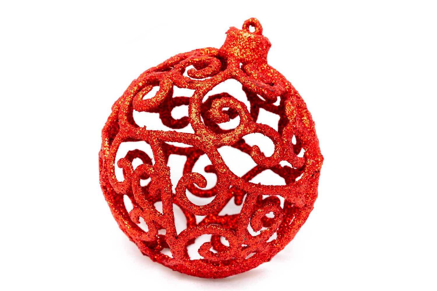 A product packshot of a red Christmas decoration by Danny Loo