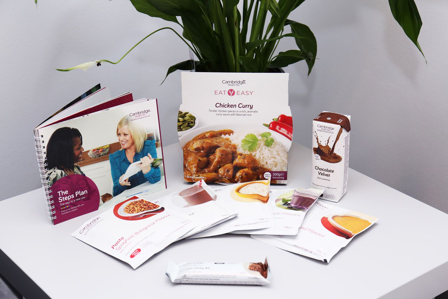 Product shot promoting different lines of the Cambridge Diet by Danny Loo