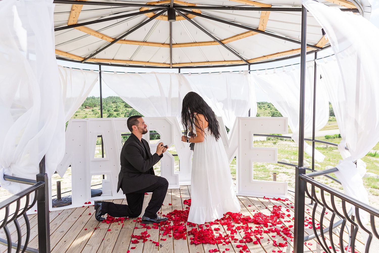 A romantic, surprise proposal at 290 Wine Castle in the Texas hill country.