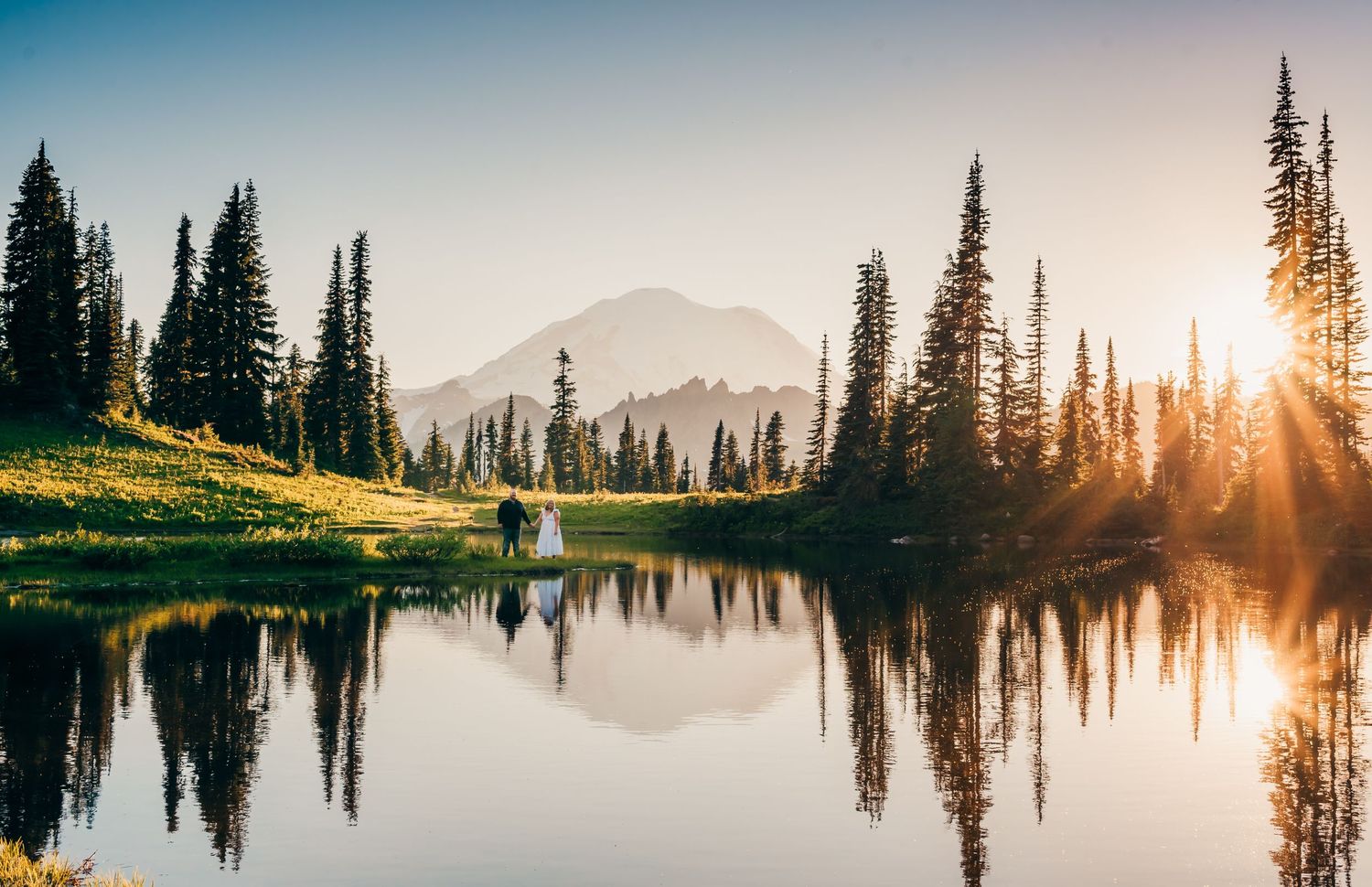 Beautiful couple at Tipsoo Lake at Mt. Rainier National Park, Washington.