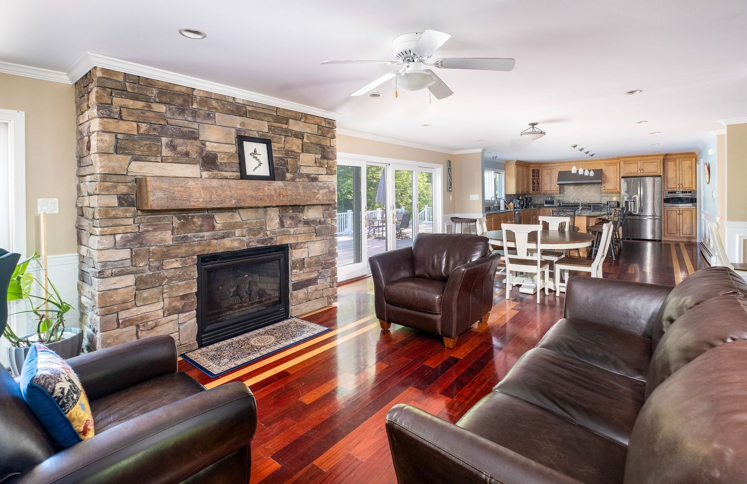 Interior shot of living room and kitchen at vacation rental property in Harrison, Maine.