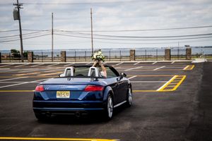 couple driving away wedding